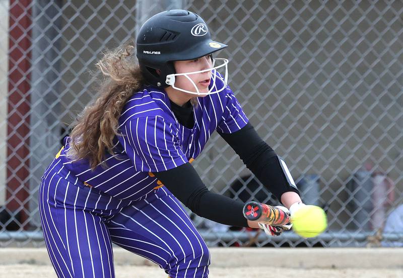 Mendota's Talia White lays down a bunt during their game against Indian Creek Thursday, March 14, 2024, at Indian Creek High School in Shabbona.