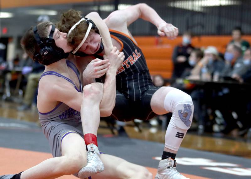 Wauconda’s Lucas Galdine, left, won the title bout over Crystal Lake Central’s Payton Ramsey at 106 pounds during IHSA Class 2A regional wrestling at Crystal Lake Central Saturday.