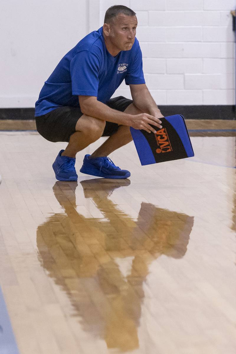 Newark Head Coach PJ McKinney watches an intense point in the second set during a match between against Seneca at Newark Community High School on September 9, 2024.