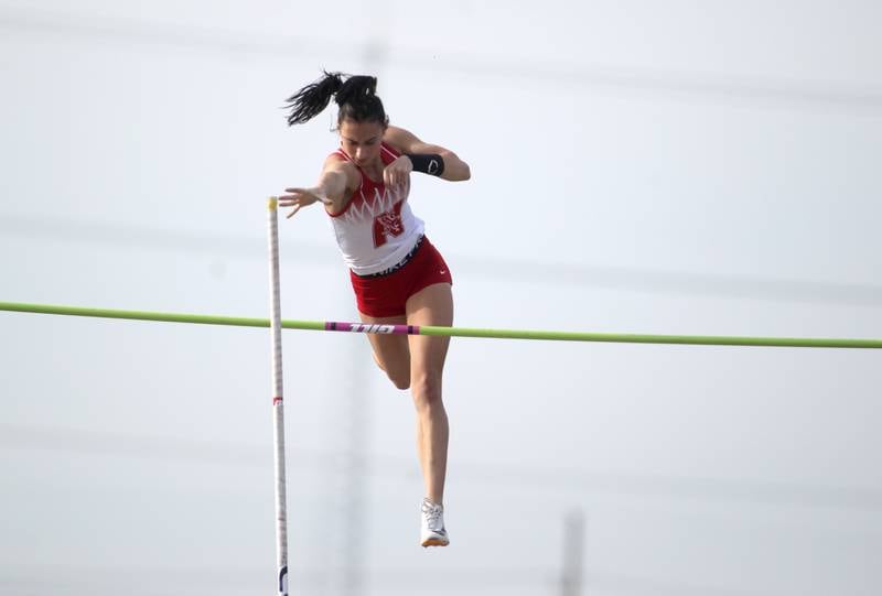 Naperville Central’s Kait McHale competes in the pole vault during the Class 3A Metea Valley girls track and field sectional on Thursday, May 11, 2023.