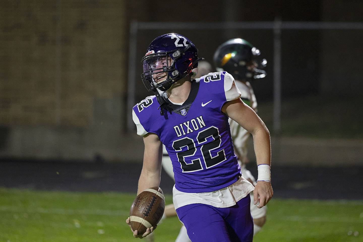 Dixon’s Aiden Wiseman scores an early first quarter touchdown Friday, Oct. 21, 2022 against Rock Falls.