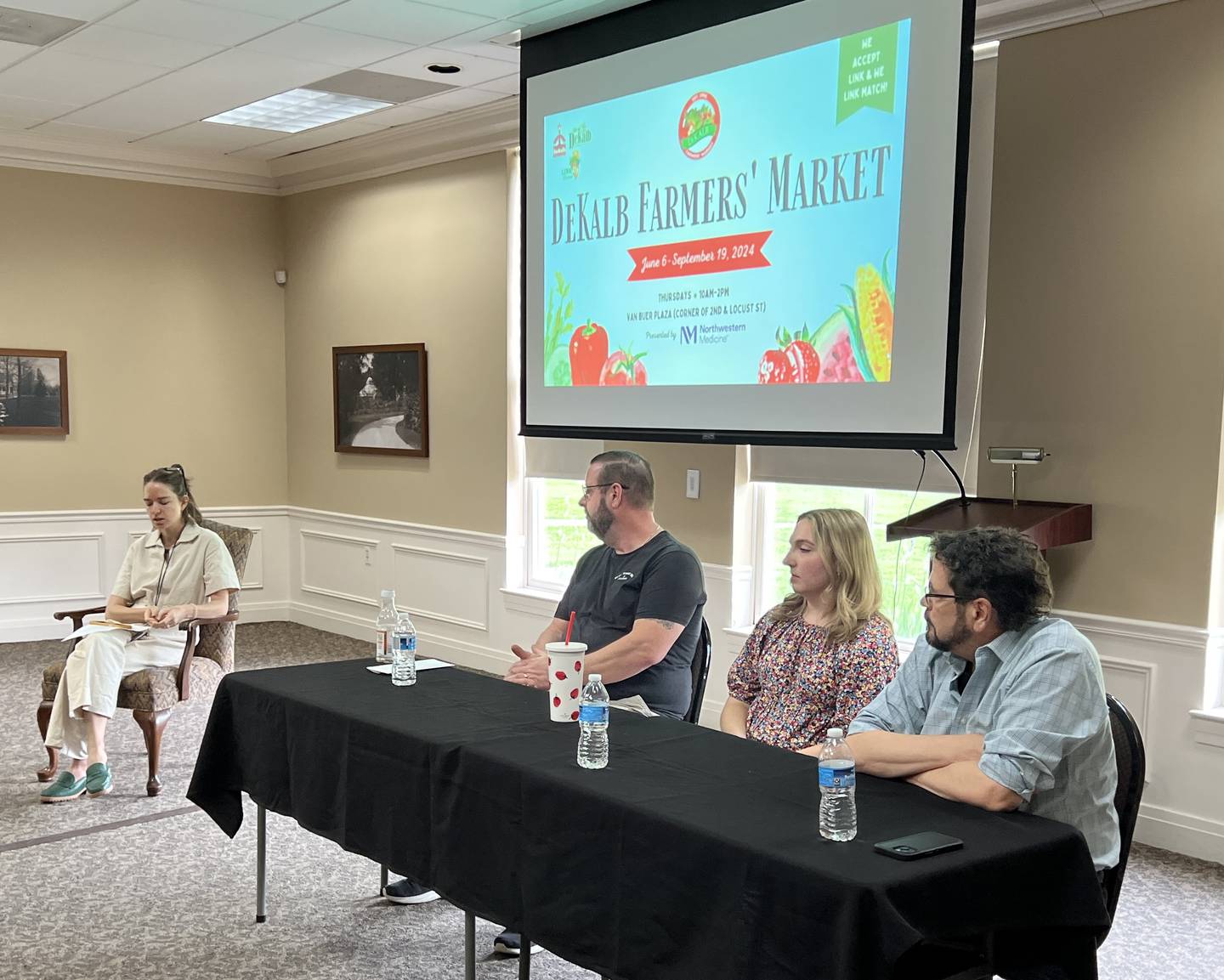 Ellwood House Curator of Education and Interpretation Aubrey King moderated a panel discussion between DeKalb County Farmer's Market stakeholders Dan Dietz, Virginia Filicetti and Gavin Wilson on May 2, 2024, inside the Ellwood House Museum.