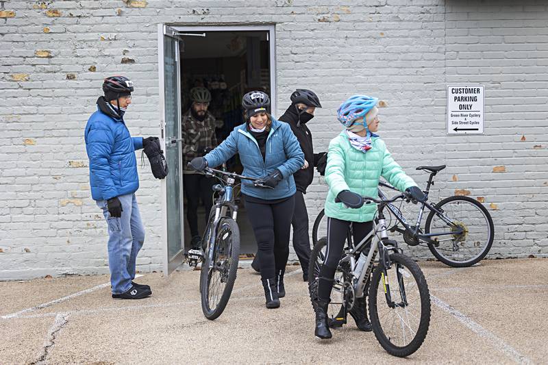 Bikers leave Green River Cyclery in Dixon Monday, Jan. 1, 2024 as they begin the nearly 10 mile New Years Day bike ride. The group rode out to Lowell Park and back.