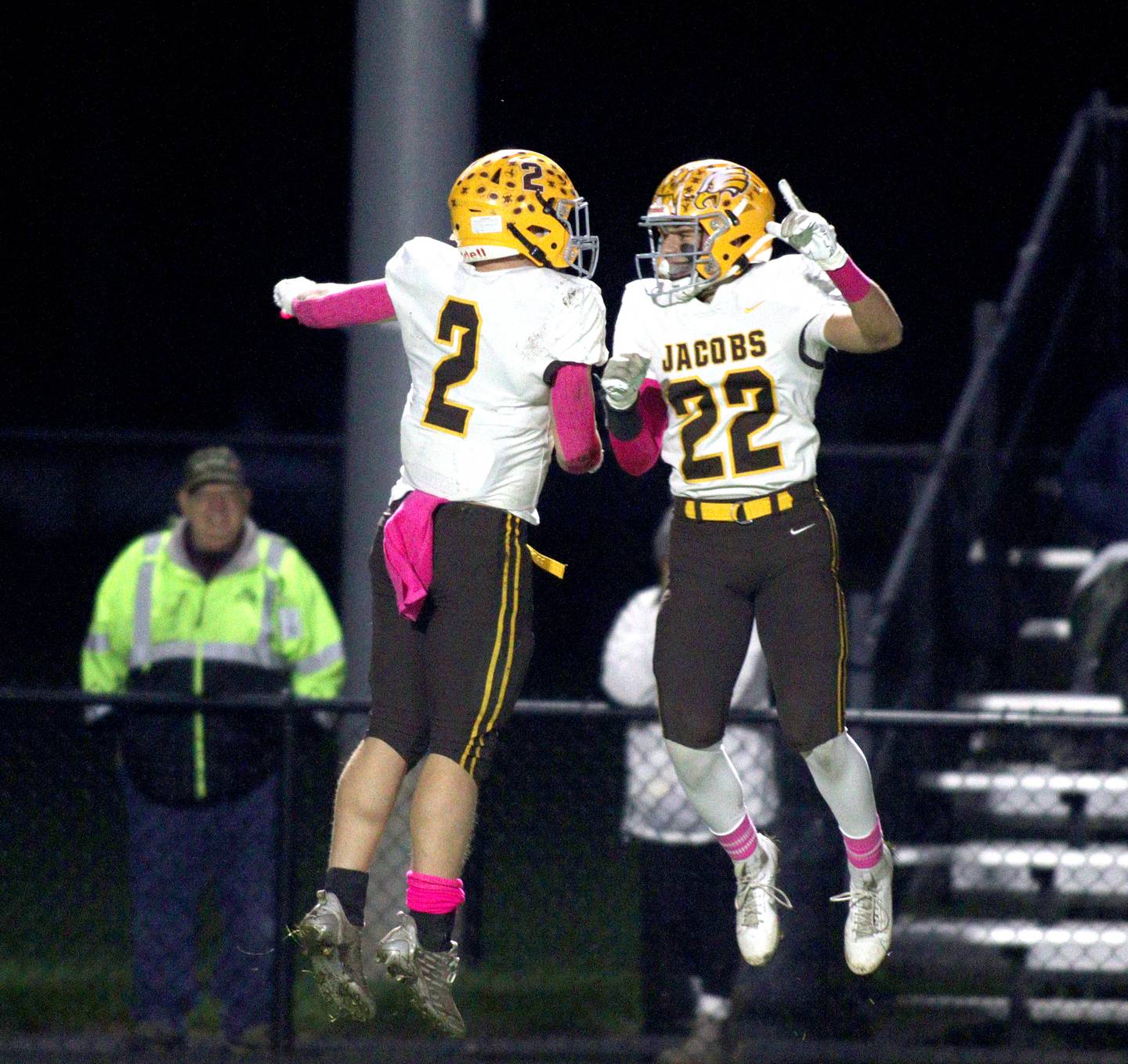 Jacobs’ Caden DuMelle (2) celebrates with Luke Gormsen (22) after a DuMelle touchdown in varsity football at Metcalf Field on the campus of Crystal Lake Central Friday night.