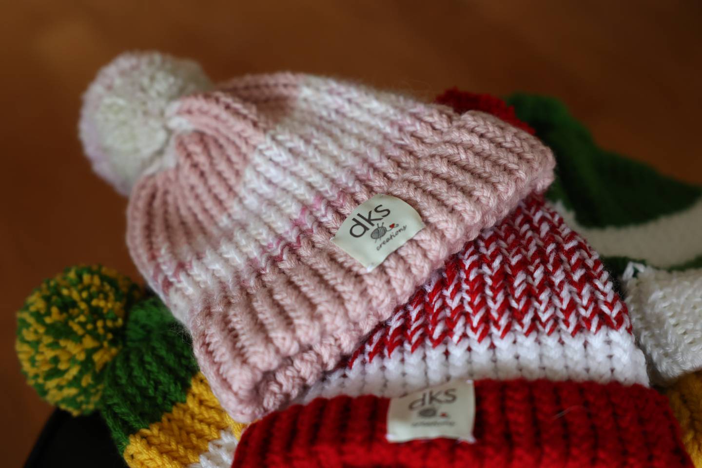 Dolores Spangler, 95 years old, took up knitting stocking caps during the pandemic in 202 and since has made over 400 hats, that she gives away in exchange for a photo wearing her work.