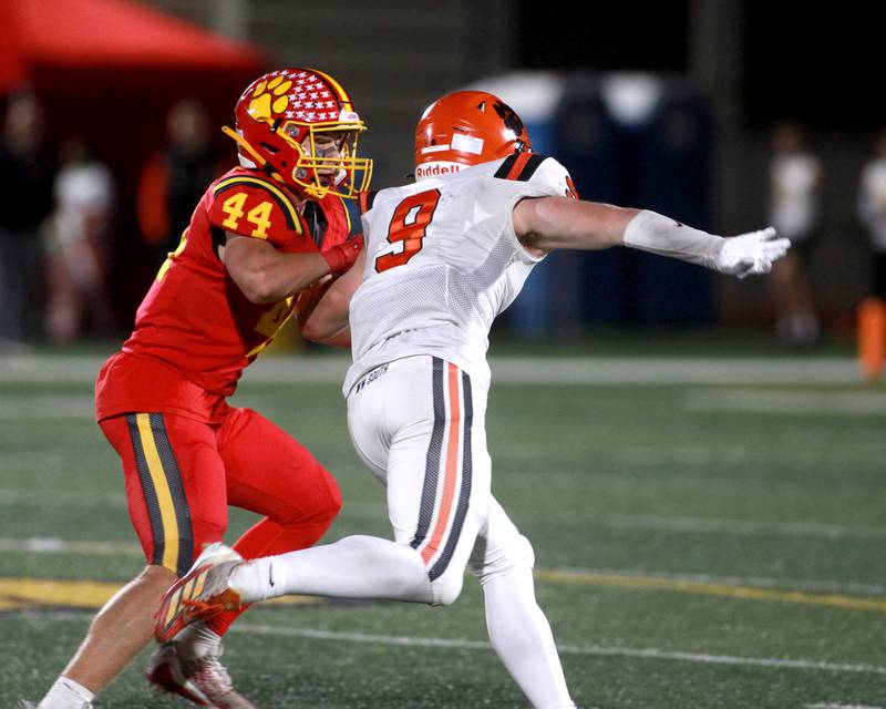 Batavia’s Jake Feller covers Wheaton Warrenville South’s Kirby Christensen on Friday, Oct. 18, 2024 during a game at Batavia.