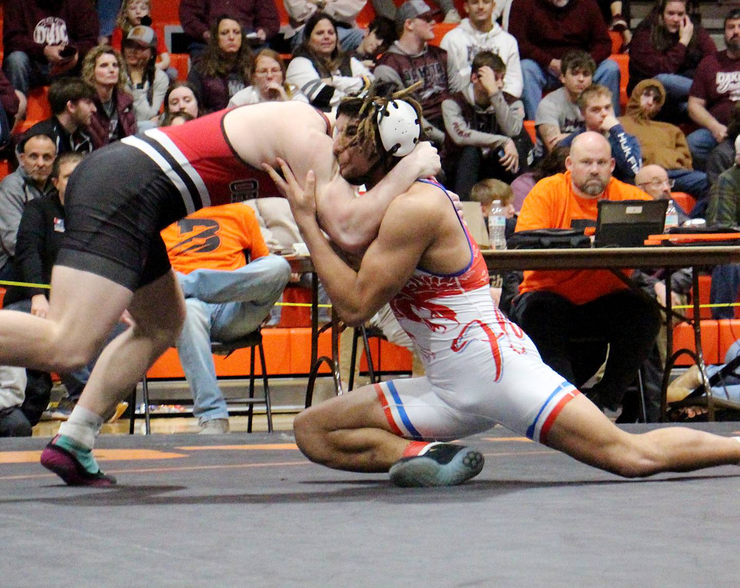 Oregon's Quentin Berry wrestles Orion's Maddux Anderson in the 190-pound first-place match Saturday, Feb. 10, 2024, at the Class 1A Byron Sectional at Byron High School.