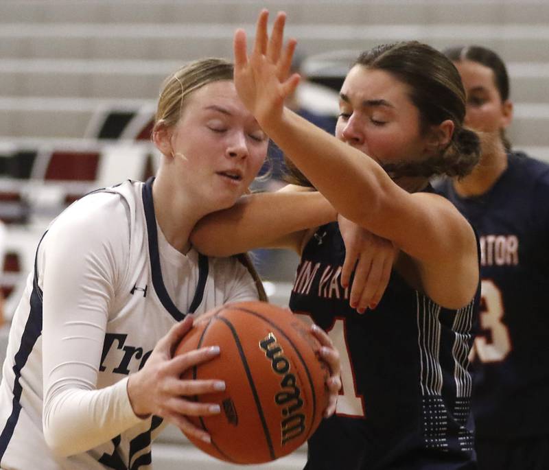 St. Viator's Ellen Denten blows Cary-Grove's Alivia Nielsen in the neck as Denten rebounds the ball during an IHSA Class 3A Antioch Sectional semifinal girls basketball game on Tuesday, Feb. 20, 2024, at Antioch High School.