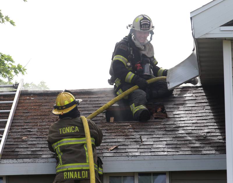 Tonica, and Leonore firefighters work the scene of a structure fire in the 1900 block of East 8th Road on Wednesday, May 8, 2024 near Tonica. The fire happened just before 3:30p.m.