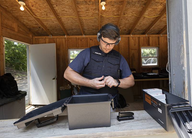 Dylan Foster reloads during range training Wednesday, July 17, 2024, as part of the Sauk Valley Police Academy.