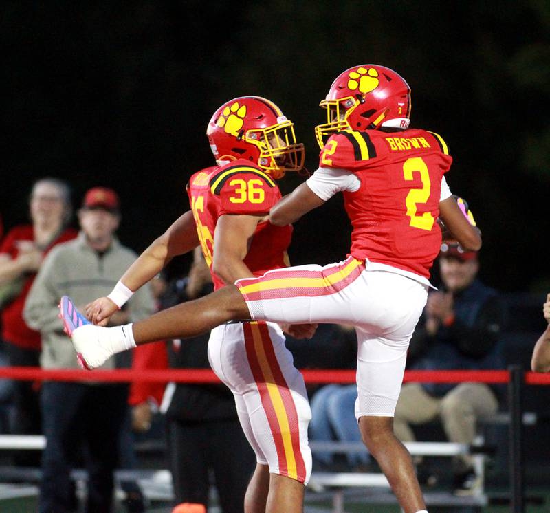 Batavia’s Preston Brummel (left) and Isaiah Brown (right) celebrate Brown’s touchdown during a game against South Elgin Friday, Sept. 6, 2024 in Batavia.