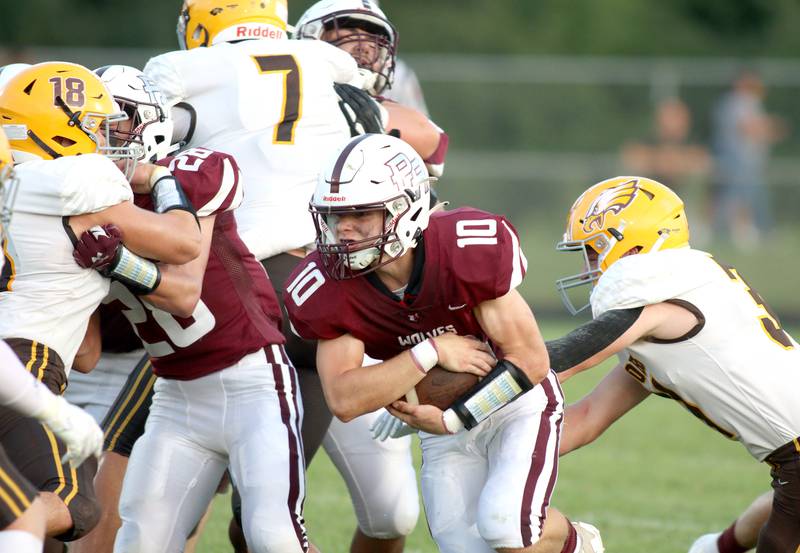 Prairie Ridge’s Jack Finn runs the ball against Jacobs in varsity football at Crystal Lake Friday night. Prairie Ridge won 6-0.