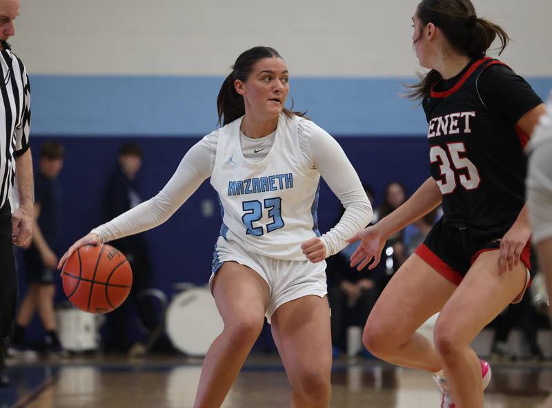 Nazareth’s Danielle Scully (23) handles the ball against Benet during a girls varsity basketball game on Monday, Jan. 29, 2024 in La Grange Park, IL.