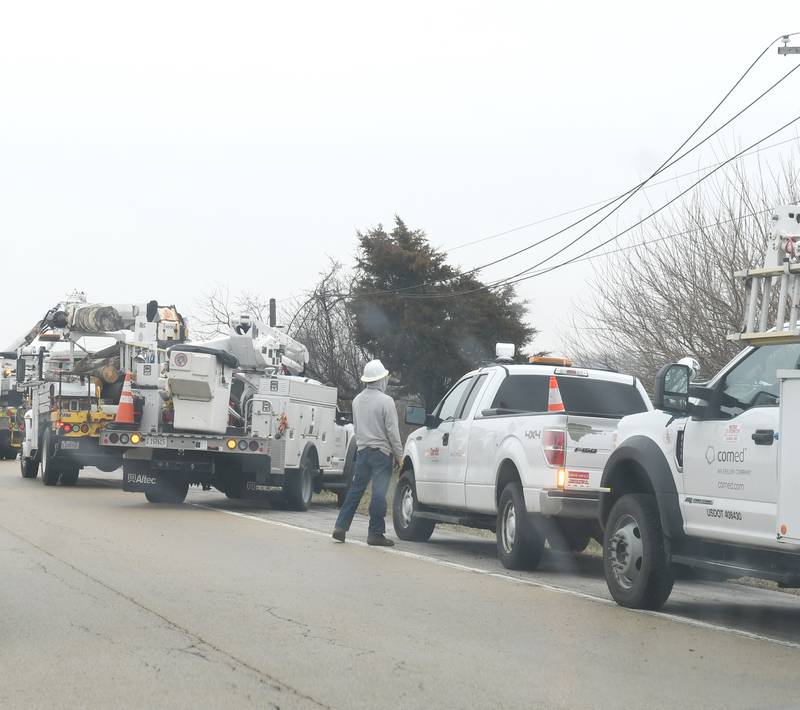 ComEd crews were busy working on the west side of Illinois 2 after Tuesday's hail storm broke off electrical poles knocking electricity out to Grand Detour.