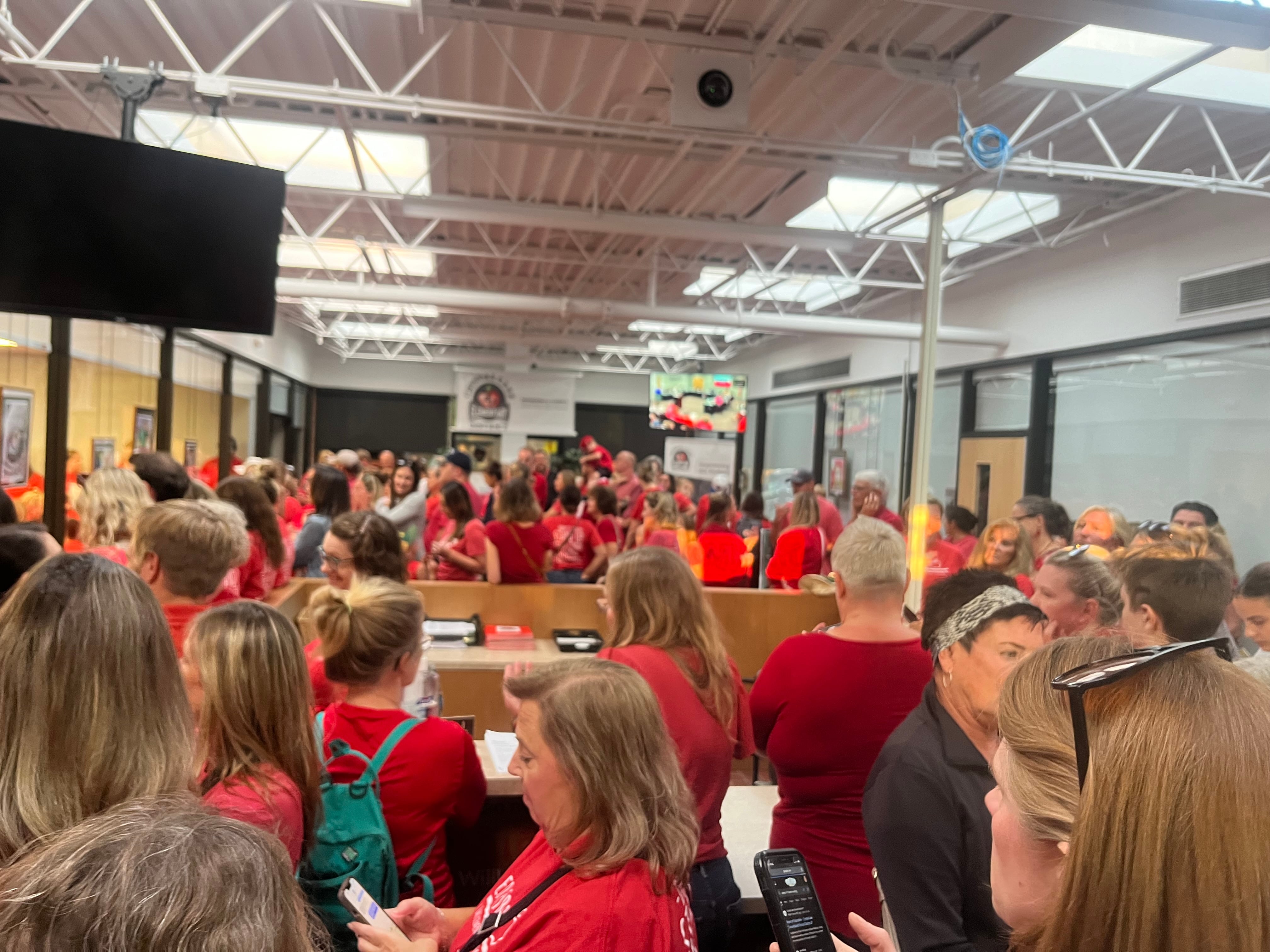 Hundreds of parents and teachers packed the Crystal Lake District 47 administration office during a board meeting to show solidarity during contract negotiations with teacher union.