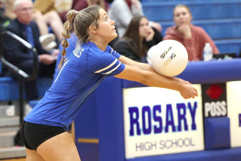 Rosary's Lilli Riddiford bumps the ball during their Regional semifinal match against Genoa-Kingston Tuesday, Oct. 25, 2022, at Rosary High School in Aurora.