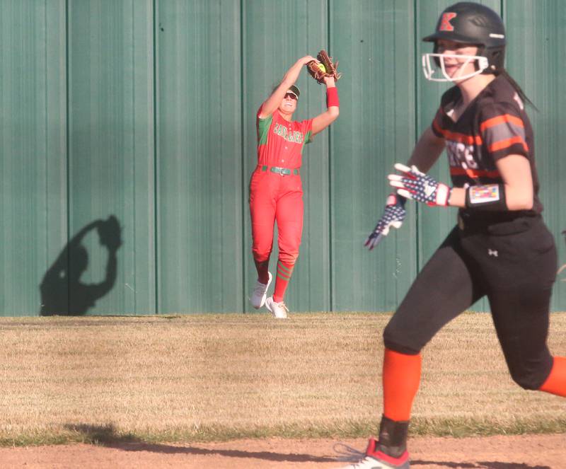 L-P's center fielder Karmen Piano makes a catch on the warning track as Kewarnee's Kieryn Abernathy rounds second base on Monday, March 11, 2024 at the L-P Athletic Complex in La Salle.