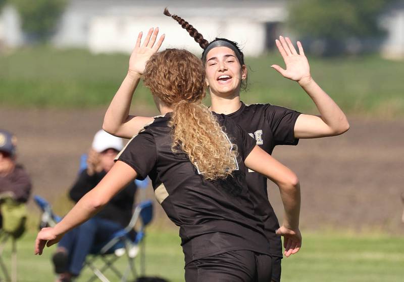 Sycamore's Kate Elsner (left) celebrates after scoring a goal with teammate Vivie Chamoun during their Class 2A regional semifinal game against Woodstock Wednesday, May 15, 2024, at Kaneland High School in Maple Park.