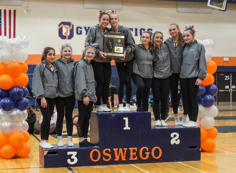 Oswego Co-op wins the Oswego Regional Gymnastics Meet at Oswego High School on Monday, Jan 29, 2024.