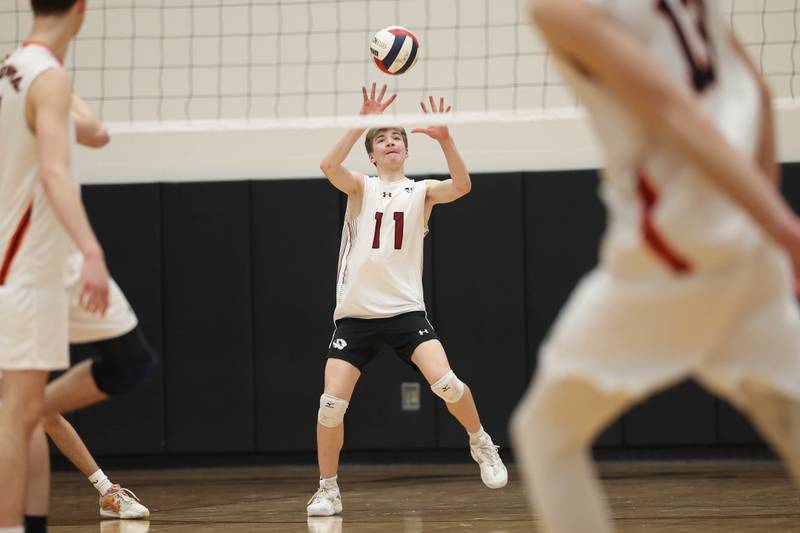 Plainfield North’s Sean Jansen recieves the serve against Lincoln-Way West on Monday, March 18, 2024 in New Lenox.