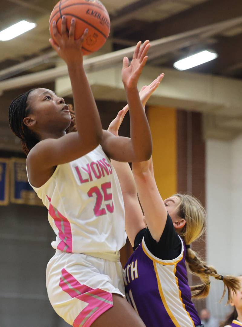 Lyons’ Nora Ezike takes a shot against Downers Grove North during the girls varsity basketball game on Tuesday, Jan. 16, 2024 in La Grange, IL.