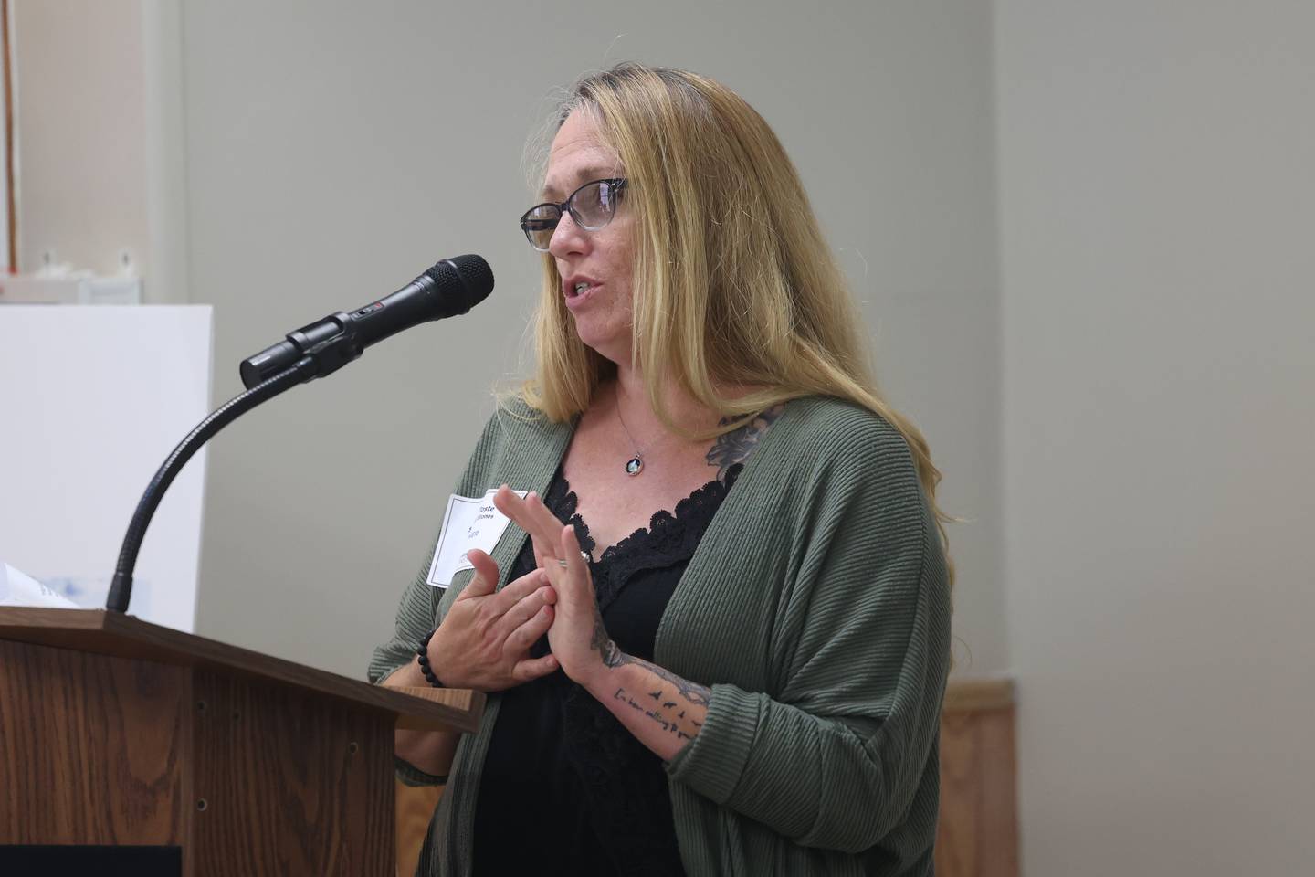 Stepping Stones Recovery Support Specialist Amie Toste speaks at the groundbreaking ceremony for the Stepping Stones Treatment Center recovery home for women and children on Friday June 28, 2024 in Joliet.