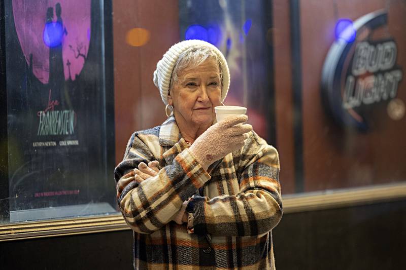 Peggy Hudgin of Tampico warms up with some hot apple cider Friday, Dec. 1, 2023 while attending Sterling’s Seasonal Sights and Sounds Christmas walk. Hudgin was eagerly waiting for her granddaughter’s fifth grade class to sing later in the evening.