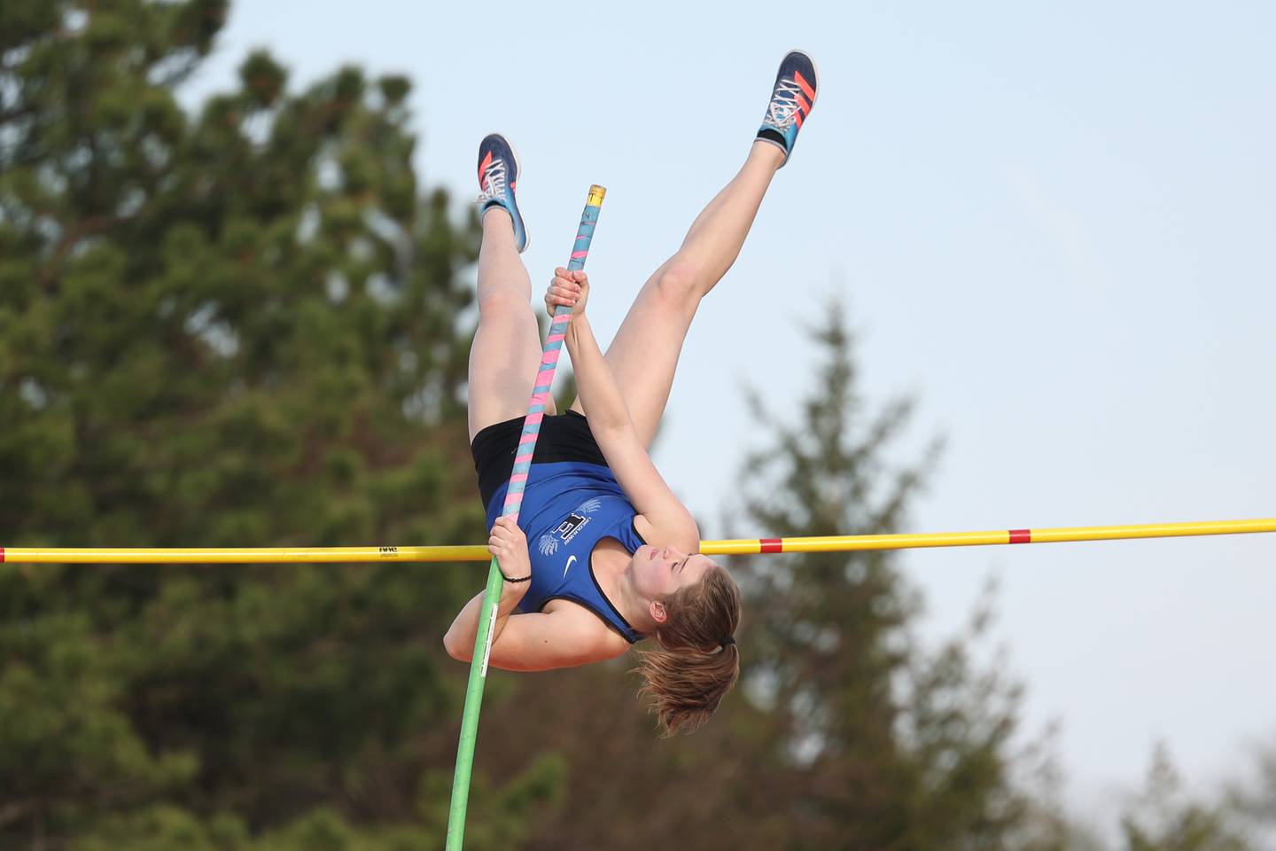 Lincoln-Way East’s Jaiden Knoop clears the bar in the pole vault at the Minooka Girls Track and Field Invitational on Friday, April 14, 2023, in Minooka.