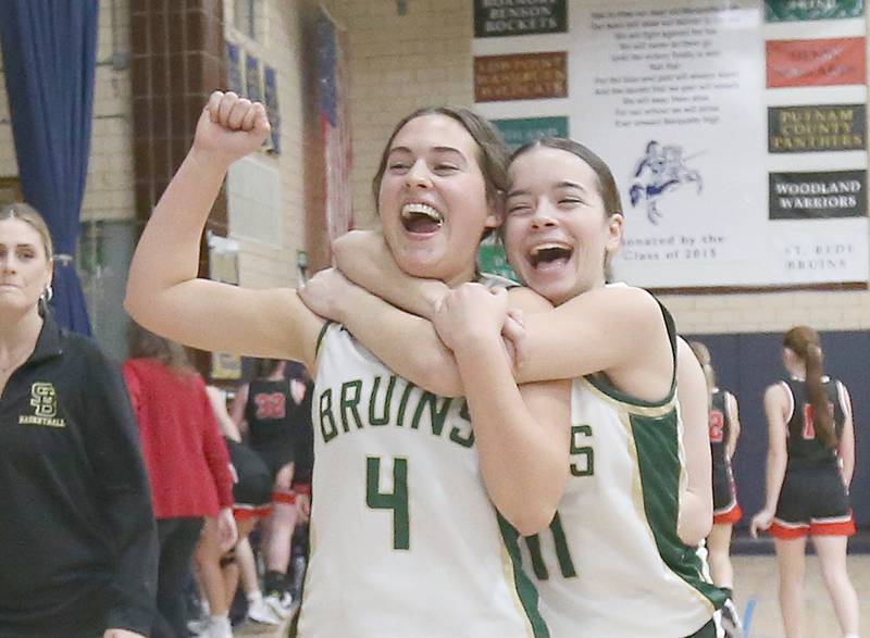 St. Bede's Jeanna Ladzinski and teammate Bailey Engels react after defeating Amboy in the Class 1A Regional final game on Friday, Feb. 16, 2024 at Marquette High School.