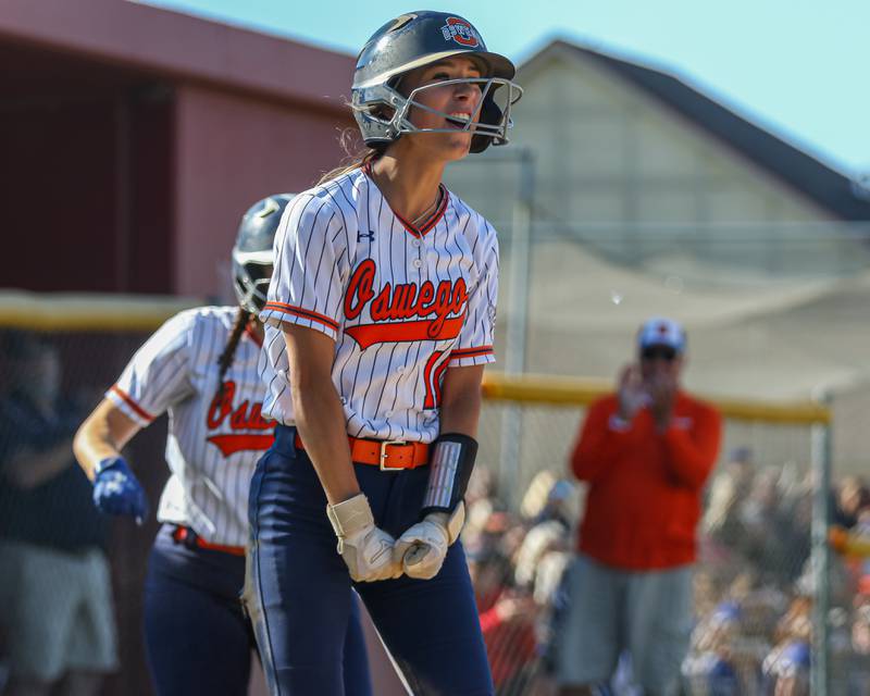 Oswego's Kaylee LaChappell (11) celebrates after scoring a run during Class 4A Plainfield North Sectional semifinal softball game between Wheaton-Warrenville South at Oswego. May 29th, 2024.