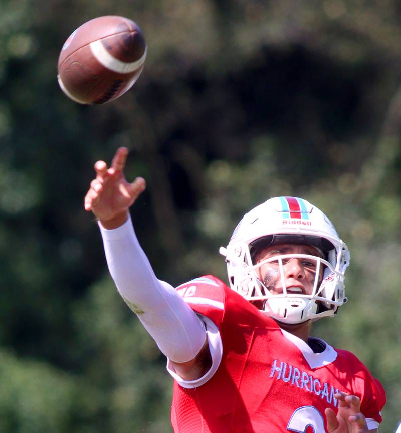 Marian Central’s Picasso Ruiz fires a pass against Bishop McNamara in varsity football action on Saturday, Sept. 14, 2024, at George Harding Field on the campus of Marian Central High School in Woodstock.