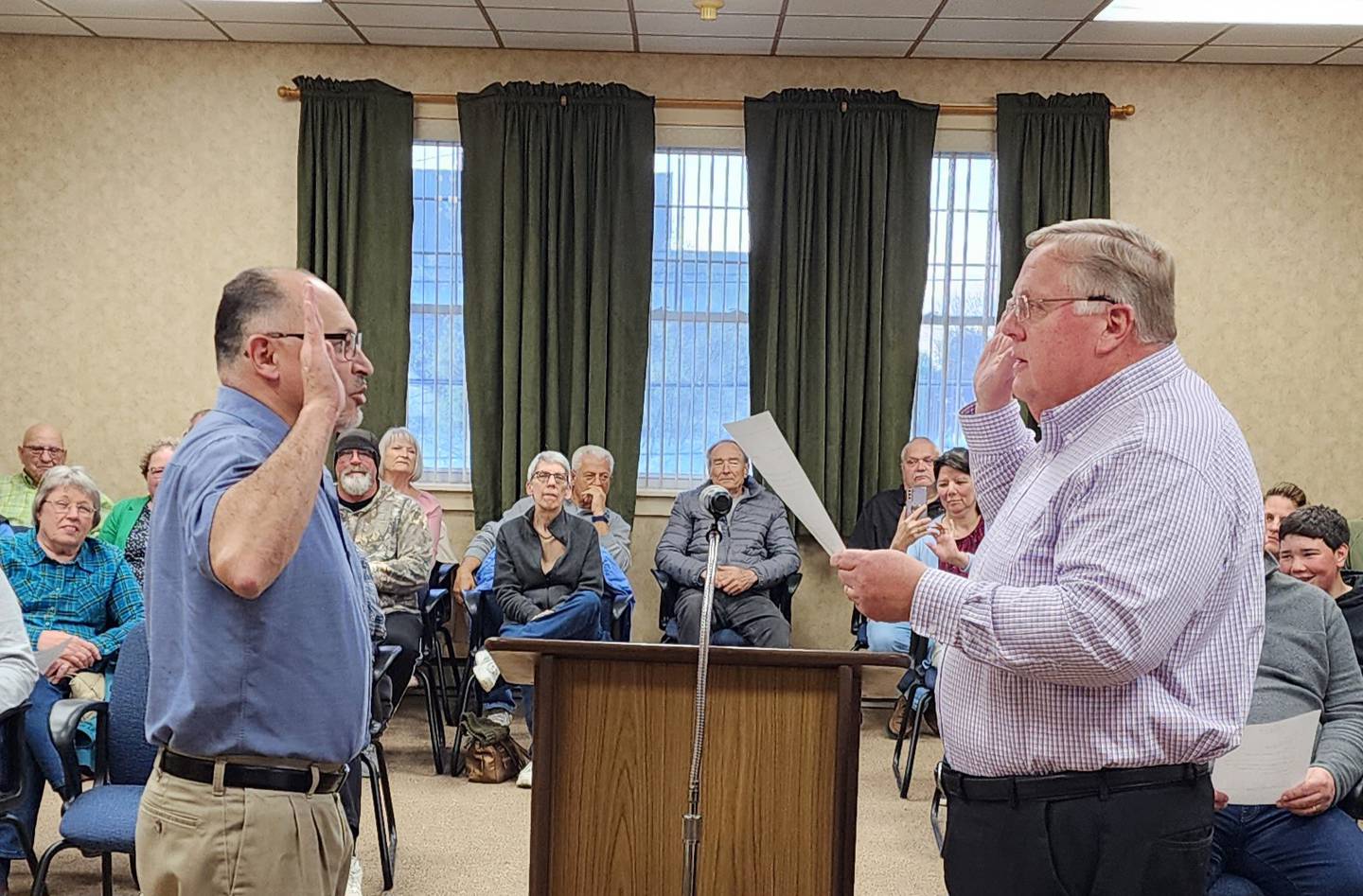 Princeton Council Member Hector Gomez delivers the oath of office to City Clerk Peter Nelson during the Monday, May 1, 2023 city council meeting.