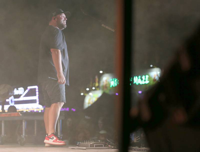 Mitchell Tenpenny smiles while performing during the 169th Bureau County Fair on Thursday, Aug. 22, 2024 in Princeton.