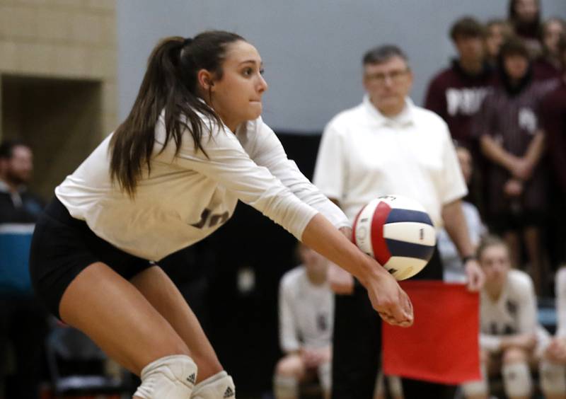 Prairie Ridge's Maizy Agnello passes the ball forward during the Class 3A Woodstock North Sectional finals volleyball match on against Belvidere North Wednesday, Nov. 1, 2023, at Woodstock North High School.