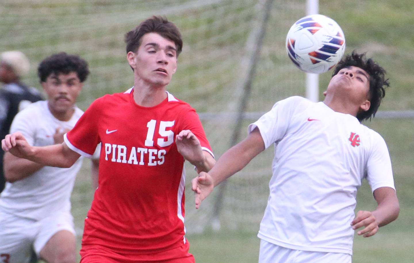 La Salle-Peru's Alex Rax knocks the ball down as Ottawa's Jordan Arroyo defends during the game on Thursday, Sept. 5, 2024 at King Field.