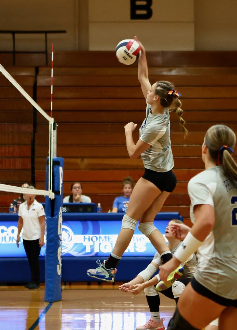 Princeton's Keighley Davis gets high for a hit Tuesday night at Prouty Gym.