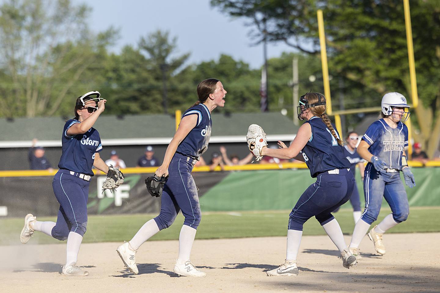 Bureau Valley’s Lesleigh Maynard (center) celebrates a diving catch to end the game and take the win against Princeton Friday, May 17, 2024 at the Class 2A regional semifinals in Rock Falls.