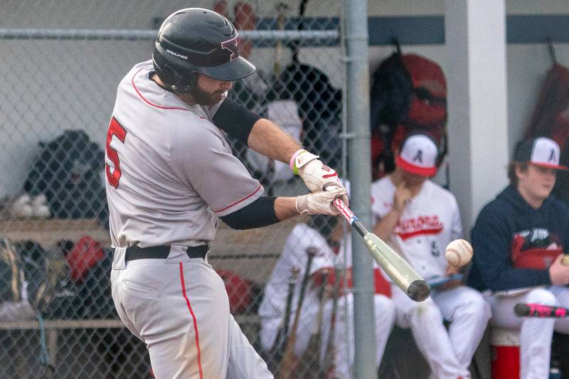 Yorkville's Everett Ford (5) singles driving in a run against West Aurora during a baseball game at West Aurora High School on Monday, April 24, 2023.