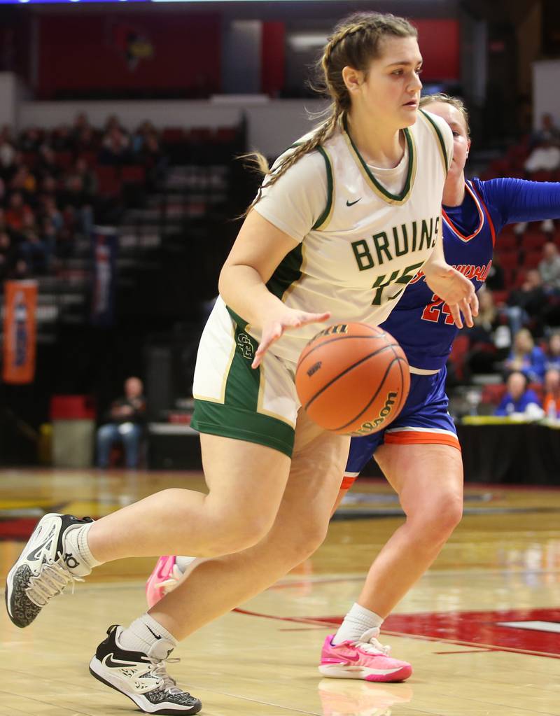 St. Bede's Savannah Bray dribbles in the lane past Okawville's Madisybn Wienstroer during the Class 1A State semifinal game on Thursday, Feb. 29, 2024 at CEFCU Arena in Normal.