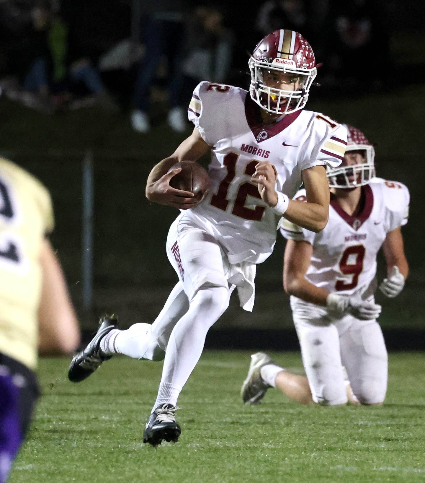 Morris' Brady Varner scrambles away from the Sycamore pass rush during their game Friday, Oct. 18, 2024, at Sycamore High School.