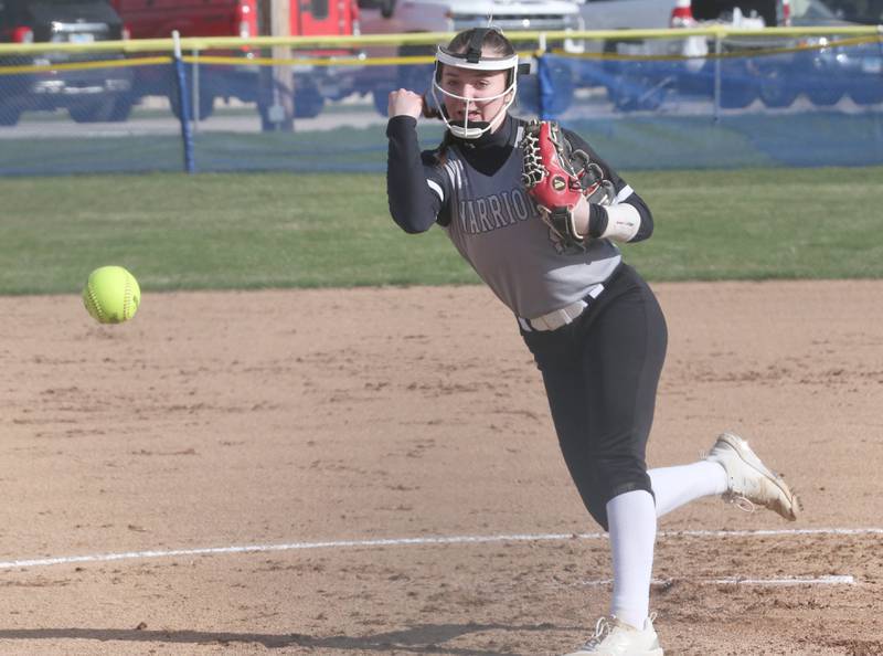 Woodland/Flanagan-Cornell pitcher Shea Simons lets go of a pitch to Marquette on Wednesday, March 27, 2024 in Ottawa.