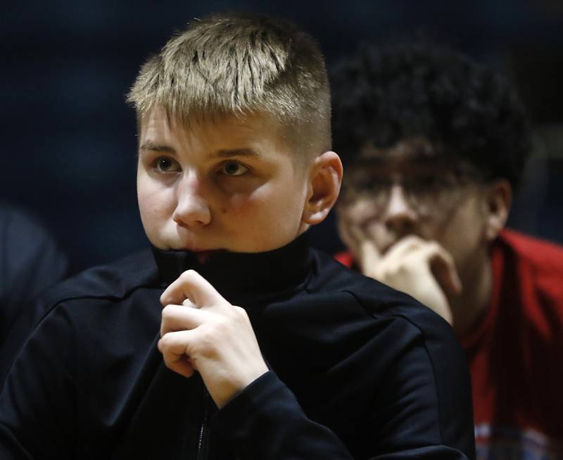 Marian Central’s Jimmy Mastny listens to a speech Friday, March 8, 2024, as the school honors its wrestlers who brought home the IHSA Class 1A Dual Team State Championship title. The celebration took place at the high school in Woodstock.