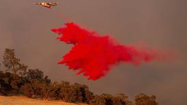 Firefighters gain ground against Southern California wildfire but face dry, windy weather