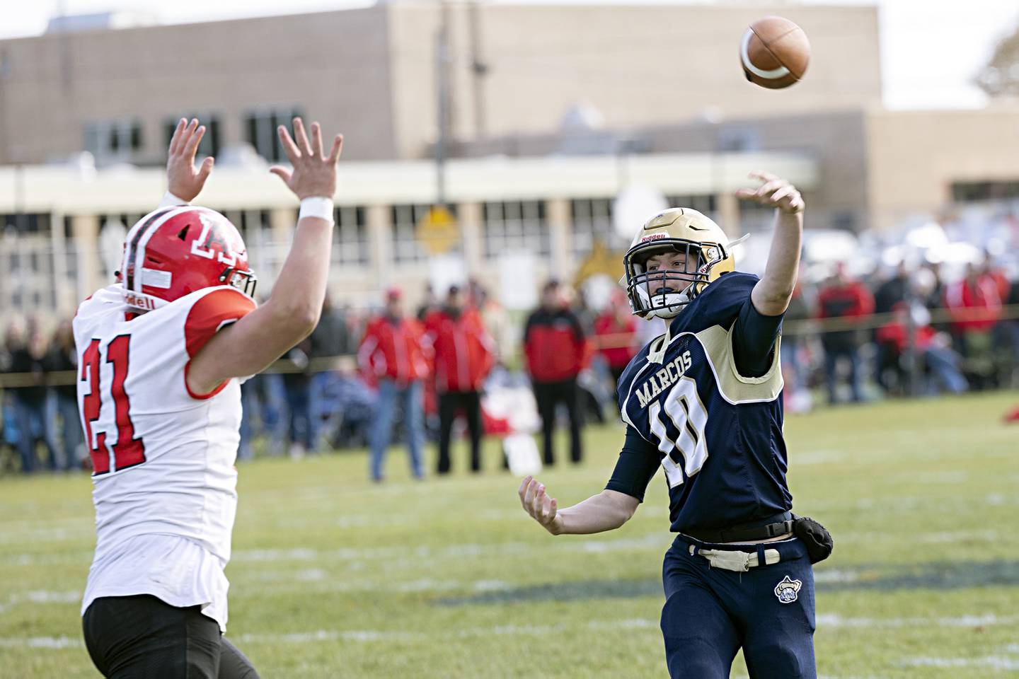 Polo’s Carter Merdian fires a pass against Amboy Saturday, Nov. 11, 2023 during a semifinal 8-man football game in Polo.