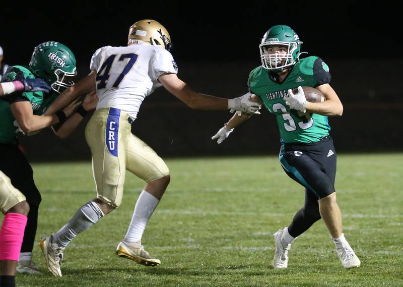 Seneca's Cameron Shriey gets outside of Marquette's Keaton Davis on Friday, Oct. 18, 2024 at Seneca High School.