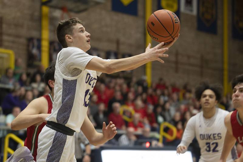 Dixon’s Cullen Shaner puts up a shot against LaSalle-Peru Wednesday, Feb. 21, 2024 at the Sterling class 3A basketball regional.