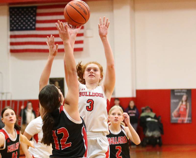 Streator's Ellie Isermann (right) shoots a shot over Henry-Senachwine's Kaitlyn Anderson (left) on Wednesday, Jan,. 4, 2023 at Streator High School.