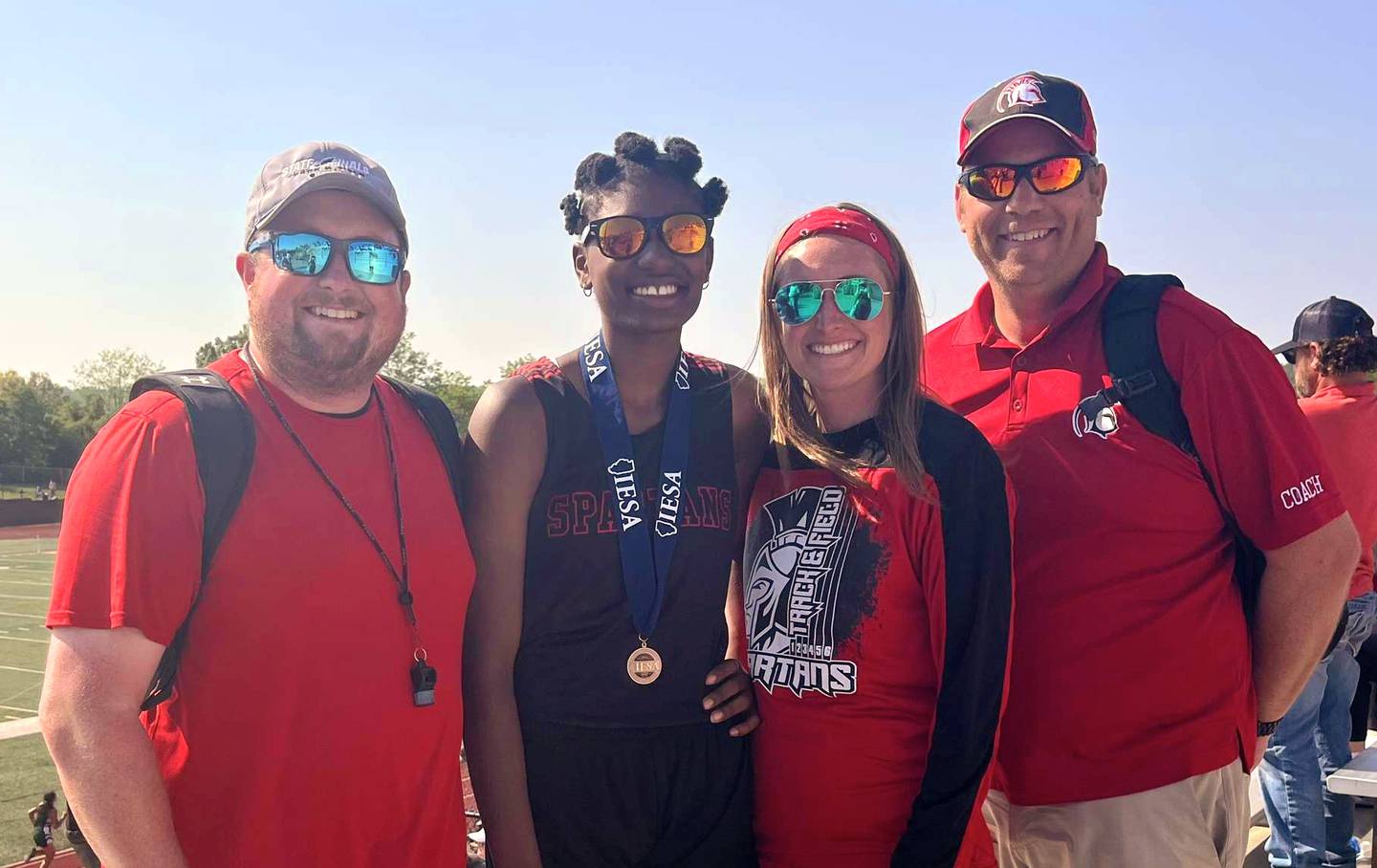 Mendota Northbrook eighth grader Mariyah Elam (second from left) placed fourth in the IESA Class 3A high jump by clearing a school record 4 feet, 11 inches.