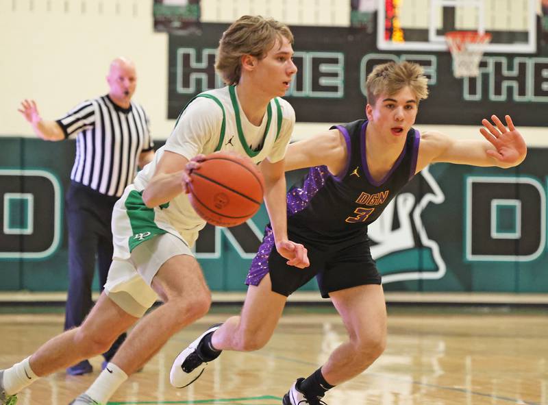 York’s Brendan Molis (12) drives the lane against Downers Grove North during a boys varsity basketball game on Saturday, Feb. 10, 2024 in Elmhurst, IL.