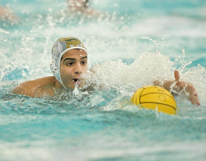 Stevenson’s Armeet Gill reaches for the ball in the IHSA boys water polo championship against Lyons in Lincolnshire on Saturday, May 18, 2024.